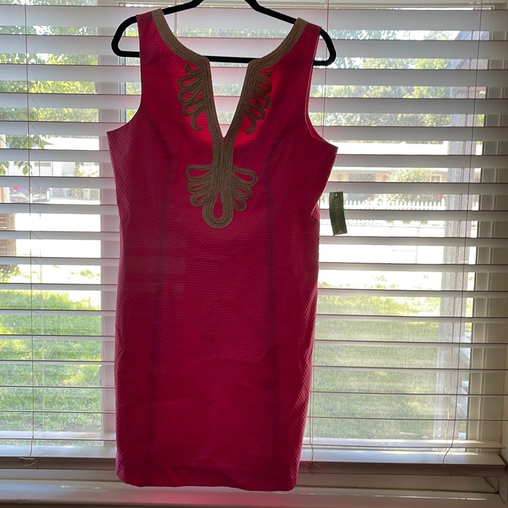 Pink Lilly Pulitzer dress with gold neckline detail